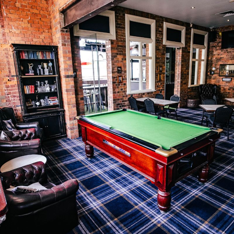 the pool table in the lounge bar at the normanby hotel. A space where functions and parties are held.